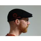 Skyll på fotografen, Göteborgs utbildningssyndikats devis i cirkel runt uggla i logga med syndikatets namn under.