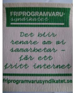 Bild på framsida av Friprogramvarusyndikatets kok- och komposterbara disktrasa med trycket: "Det blir renare om vi samarbetar för ett fritt internet"